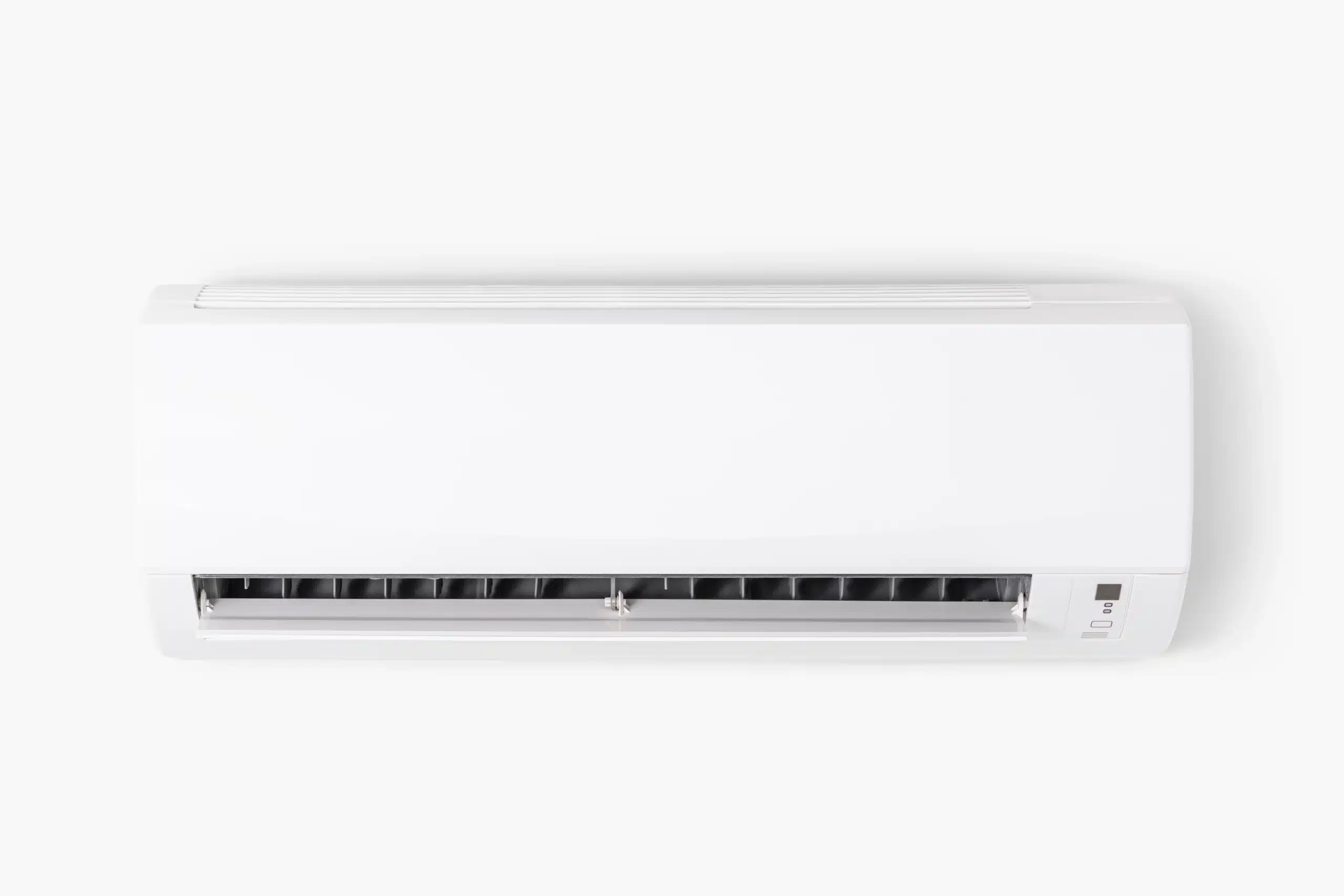 air-conditioner-mounted-white-wall air conditioner mounted on a white wall
