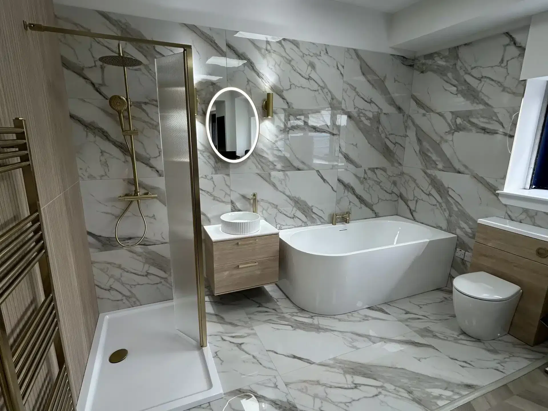 luxury bathroom with marble walls